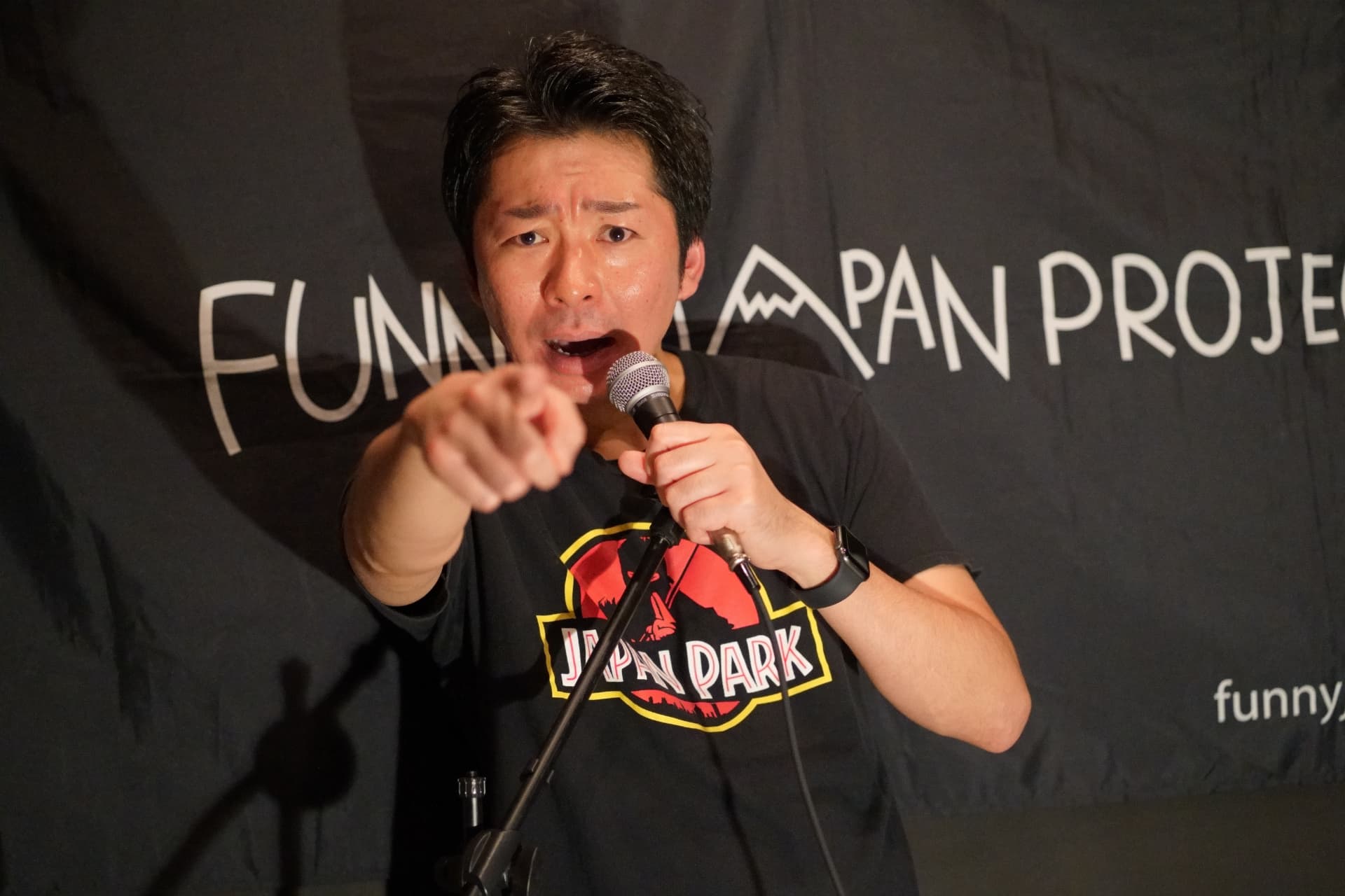 MESHIDA performing live English stand-up comedy at Kyoto Comedy in Pontocho, Kyoto